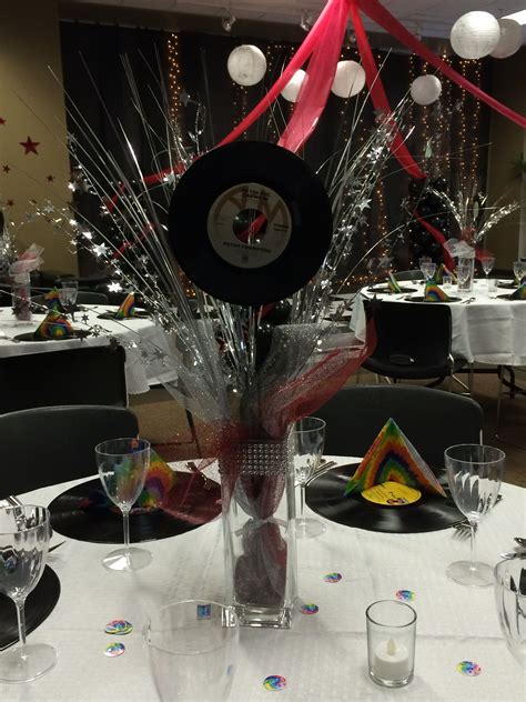 How to make decorations for a '50s theme party | ehow.com. Rock 'n' Roll Prom centerpieces | Rock and roll birthday ...