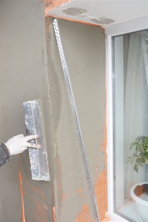 Building Contractor Plastering Wall Window Corner With Fiberglass Mesh