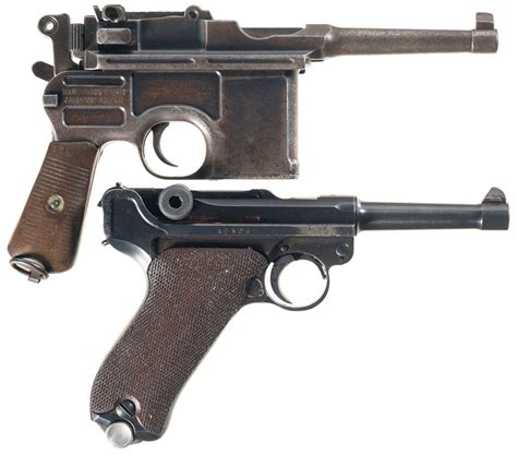Two Semi Automatic German Pistols A Mauser Broomhandle Pistol