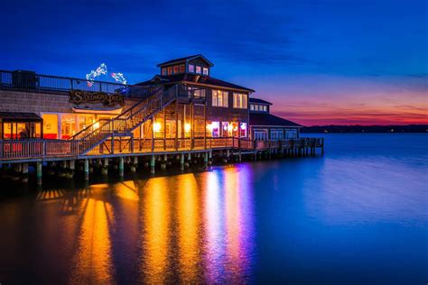 Solomons Pier Restaurant Reflecting In The Patuxent River At Sunset