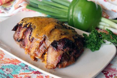Bacon Wrapped Bbq Meatloaf Stuffed With Cheese Recipe Just A Pinch