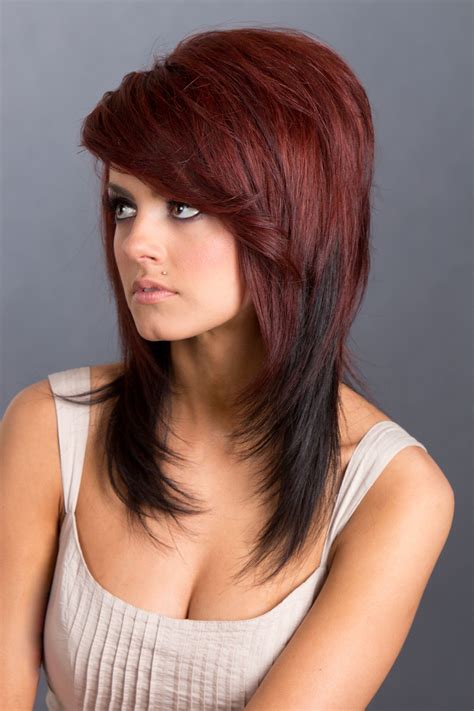 Do you love to experiment with your hair color? Medium length hair from red into brunette with layers and ...