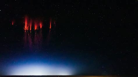 Ethereal Photos Capture Rare Red Lightning Phenomenon