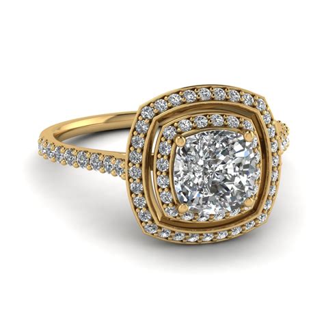 Yellow gold will intensify the diamond's yellow, and is the more popular pick when setting a yellow diamond. Micropave Cushion Halo Diamond Engagement Ring In 14K Yellow Gold | Fascinating Diamonds
