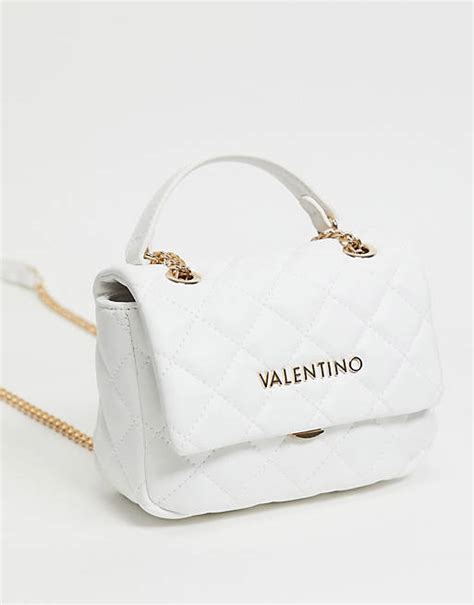 valentino bags ocarina cross body bag in white quilt with chain strap asos