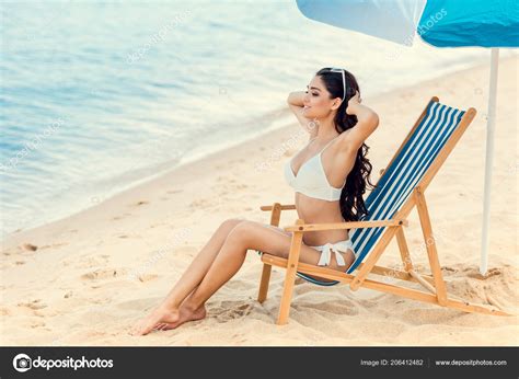 Smiling Teenage Girl Sitting In Beach Chair Grand Cayman Relaxation Water Stock Photo