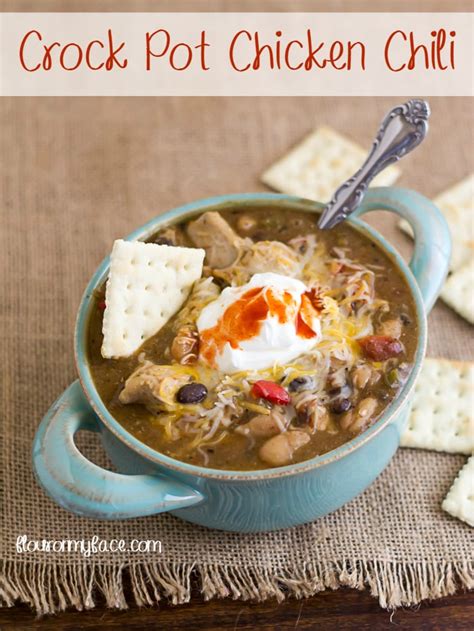 Creamy chicken chili with southwest flavors that cooks right in the crock pot. Crock Pot Chicken Chili Recipe - Flour On My Face