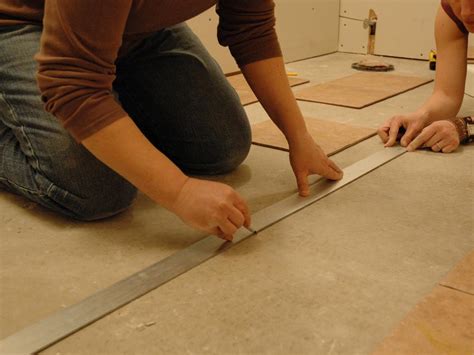 Read this article to find out everything you need to know about laying a tile floor from measuring and layout to cutting and laying tile. How to Install Tile on a Bathroom Floor | HGTV