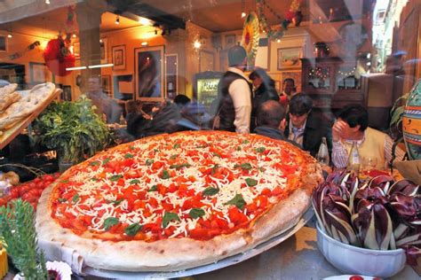 Big Pizza Displayed In Restaurant Window In Venice Italy Editorial