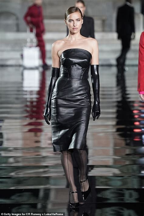 Irina Shayk Gets Back To Work In Dominatrix Inspired Leather Dress