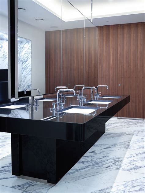 They have the potential to be unique and carry the theme of the rest of the facility throughout. Luxury Commercial Bathroom Design VOLA 590 in 2020 | Modern bathroom design, Commercial bathroom ...