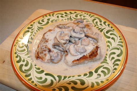 Lay pork chops over the onions. COOK WITH SUSAN: Pork Chops with Cream of Mushroom Soup