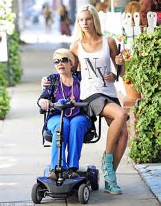 Joan Rivers Patrols The Streets In A Mobility Scooter As She Gives A