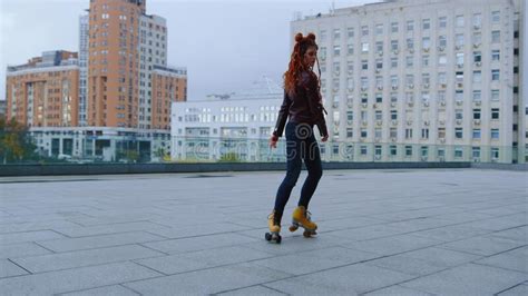 Active Ginger Woman Dancing On Rollerblades Roller Skater Girl
