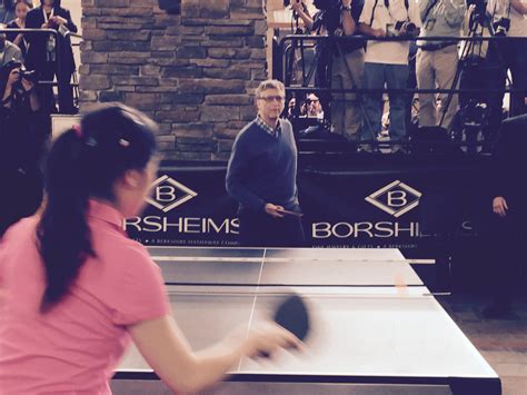 2015 05 03 bill gates plays ping pong with ariel hsing at borsheim s in omaha nebraska at the