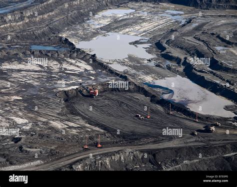 An Aerial View Of Active Bitumen Open Pit Mining In The Alberta Tar