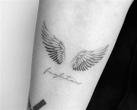 Top 121 + Angel wing images tattoos - Spcminer.com
