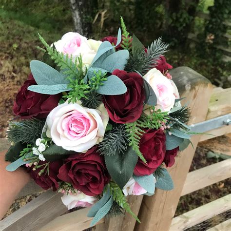 A Christmas Bouquet Of Artificial Pink And Burgundy Roses Abigailrose