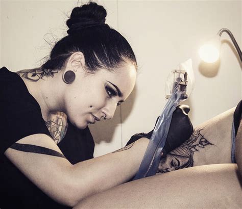 Women, tattoos, & beauty culture. Bambi at work tattoo by Bambi Tattoo | No. 2727