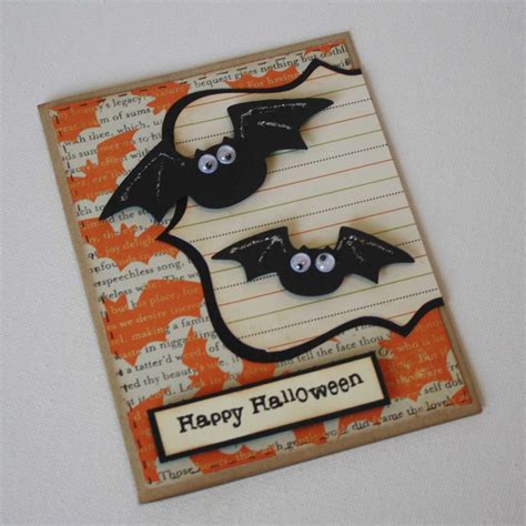 A Halloween Card With Two Bats On It