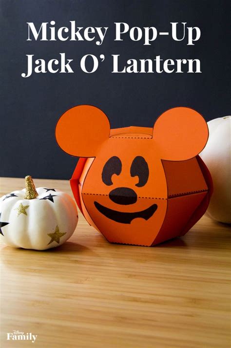 Mickey Mouse Paper Pumpkins And An Orange Box With A Face On It