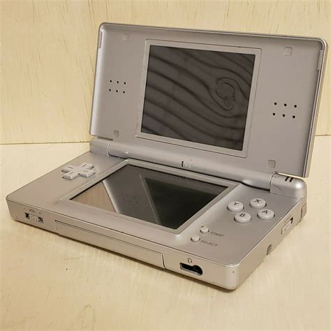 Nintendo Ds Lite Silver Usg 001 Handheld Icommerce On Web