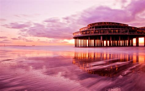 Purple sunset scenery, sea beach sky building wallpaper | travel and world | Wallpaper Better