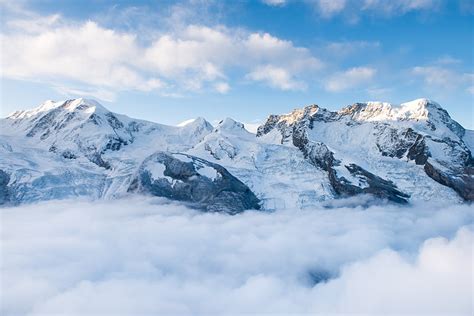 Free Download Hd Wallpaper Mountain Ranges And Sea Of Clouds Mountains Summit Snow Nature