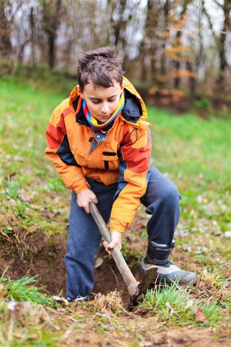 Boy Digging In The Ground Royalty Free Stock Image Image 24325106