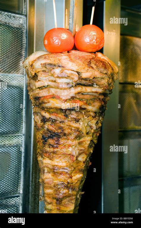Meat Cooking On Skewer For Authentic Greek Gyro Sandwich As