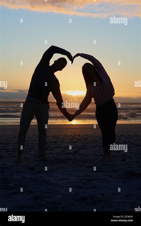 Life Is Nothing Without Love Silhouette Shot Of A Young Couple On The