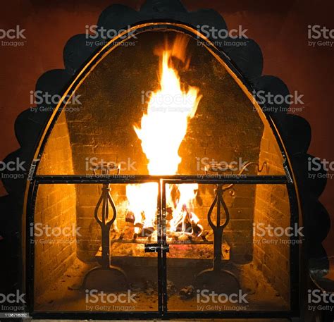 Santa Fe Nm Fire Burning In Traditional Adobe Kiva Fireplace Stock