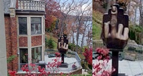 Man Buys House Next To Ex Wife Erects Gigantic Middle Finger Statue