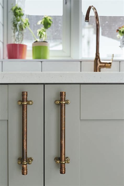 See more ideas about cabinet handles, unusual cabinet, pewter. kitchen-with-copper-handles - Tile Mountain