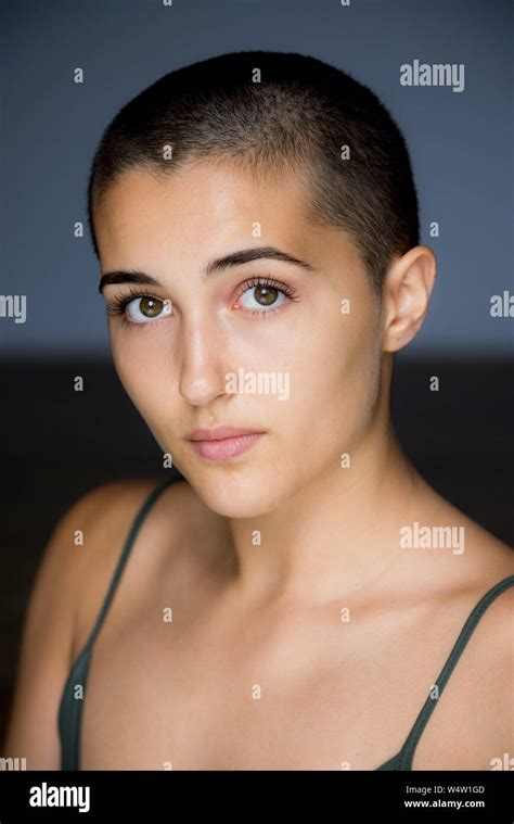 Portrait Of 20 Year Old Female With Shaved Head Stock Photo Alamy