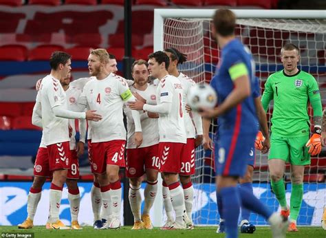 Schmeichel saved the penalty, but kane pounced on. England 0-1 Denmark: Christian Eriksen's penalty earns famous victory after Harry Maguire saw ...