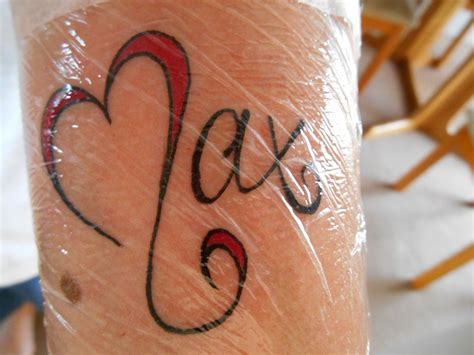 Tattoo Of The Name Max With The M Shaped Like A Heart Small