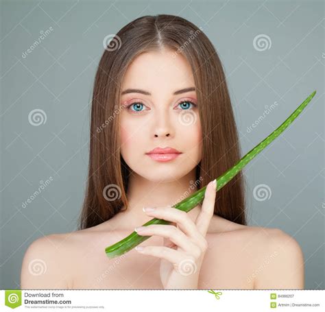Model With Aloe Vera Portrait Happy Woman With Naked Shoulders Holding