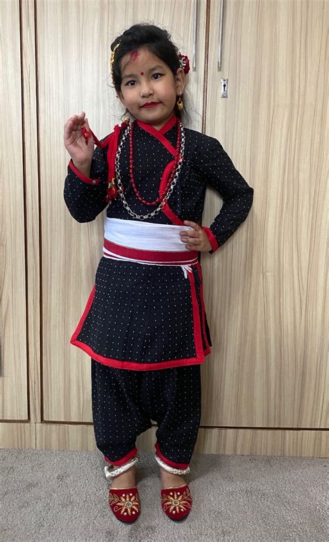 girl newari traditional dress set dress and jangawal suruwal patuki with red boarder muga red