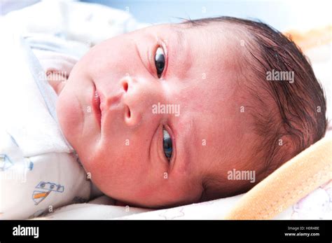 Angry Newborn Baby Face Looking At Camera Stock Photo Alamy