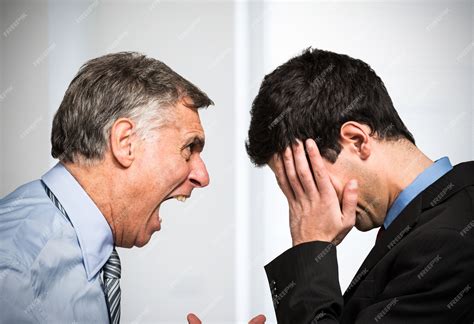 Premium Photo Angry Boss Shouting To An Employee