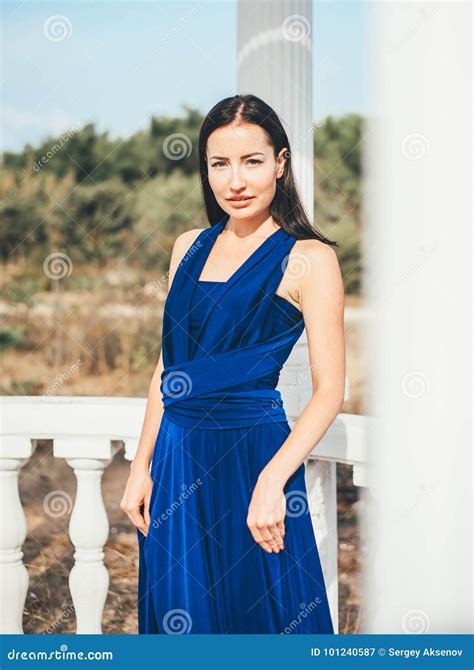 Young Beauty Woman In A Blue Dress Stock Image Image Of Elegant Hair