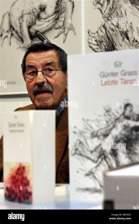 Nobel Prize Winning German Author Guenter Grass Sitting In Front Of