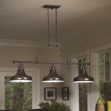 Flush mounts are an especially good fit for areas with low ceilings since it's an easy way to maximize the limited ceiling space. Quoizel QZ-EMERY3P-WS Emery Three Light Bar Pendant in Weathered Brass