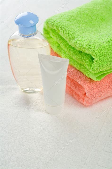 Set For Bathing On White Towel — Stock Photo © Mihalec 5085776