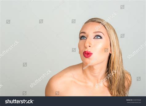 Sexy Nude Blonde Woman Blowing Kiss ภาพสตอก Shutterstock