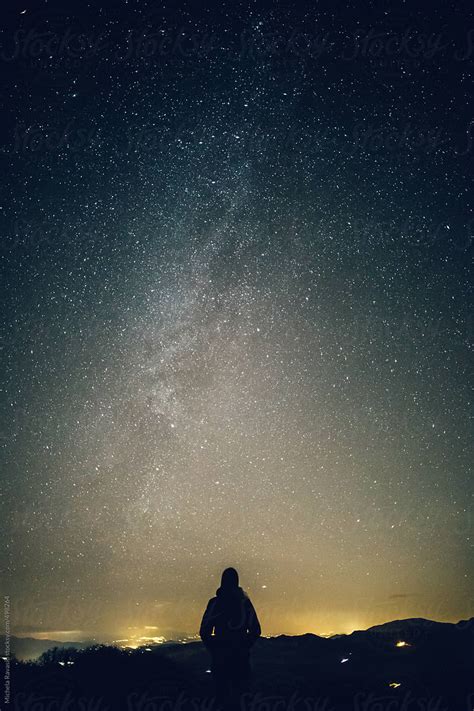 Woman Looking At The Milky Way By Stocksy Contributor Michela