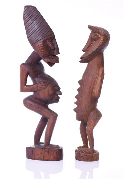 Two African Fertility Figures Carved From Wood