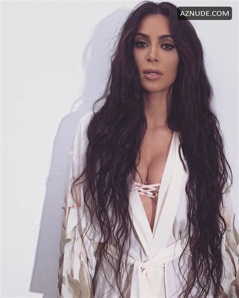 Kim Kardashian Cleavage In White AZNude