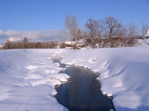 Spring In The Siberian Village Melted The River On A Clear Sunny Day